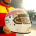 Autógrafo de Schumacher no capacete de Sir Jackie Stewart no top 5 da DHL
